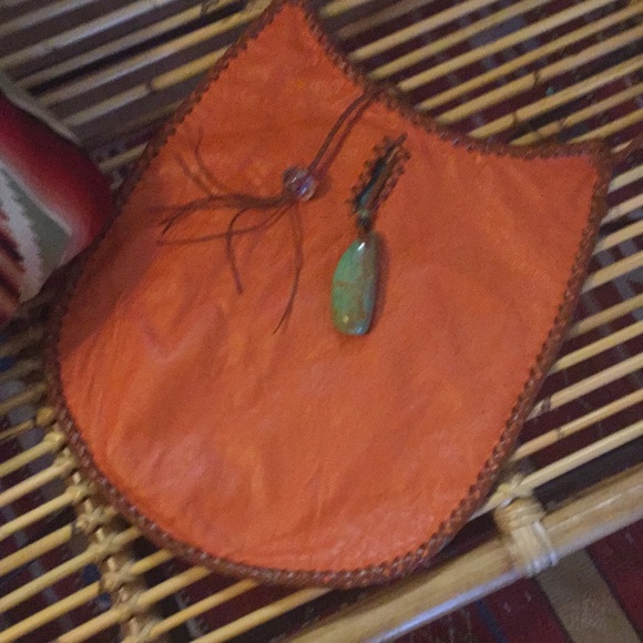 Leather and a turquoise bag